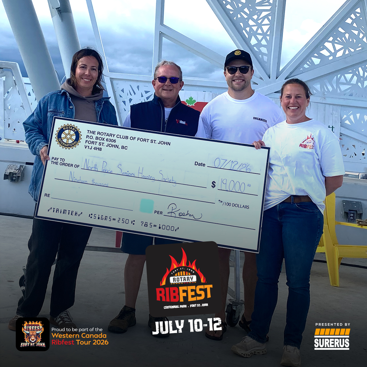 Rotary Ribfest 2026 Action Properties 50/50 proceeds went to North Peace Seniors Housing Society - L-R, NPSHS - Brook Goulet, Fort St. John Rotary - Nelson Stowe, Kris Olsen, Carina Wallis.